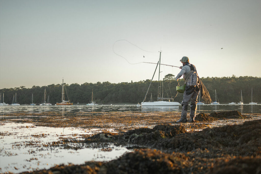pêcheur bar mouche bateau mer